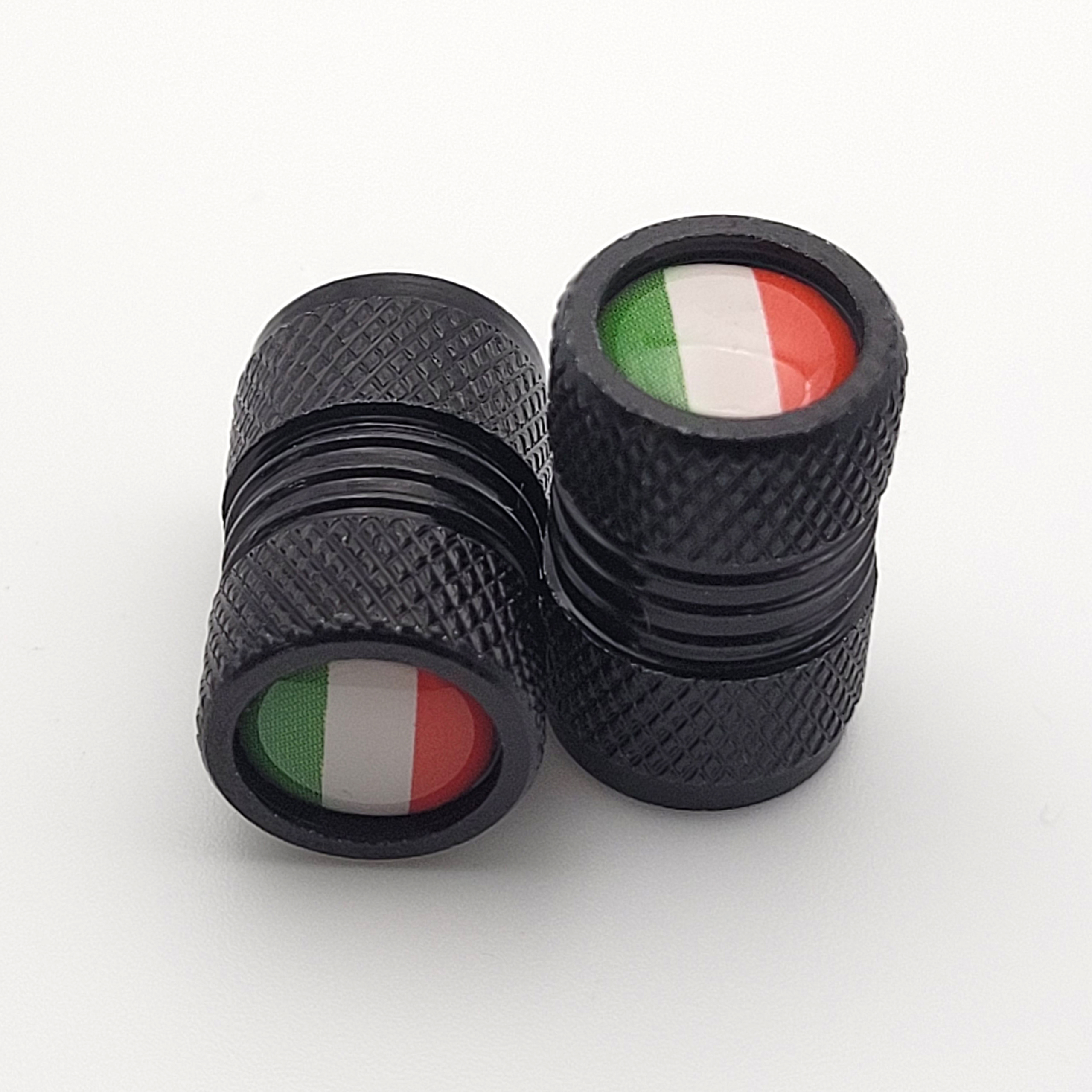 Schwarze Ventilkappen mit italienischer Flagge, strukturierter Oberfläche und sichtbarem Innengewinde.